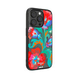 Magsafe-compatible phone cases showcasing beautiful Ukrainian designs by Victoria Radochyna for War Child